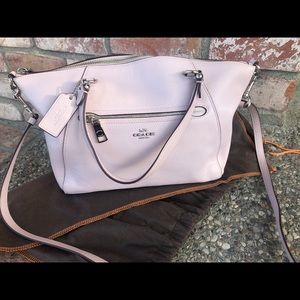 Coach bag, new (with tags, not attached). Pale pink/blush.